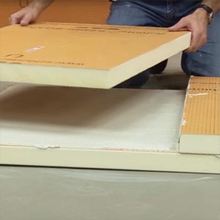 Step 1: Choose a board thickness of at least 2" and cut KERDI-BOARD panels to the desired size. Apply thin-set mortar to adhere the panels together.
