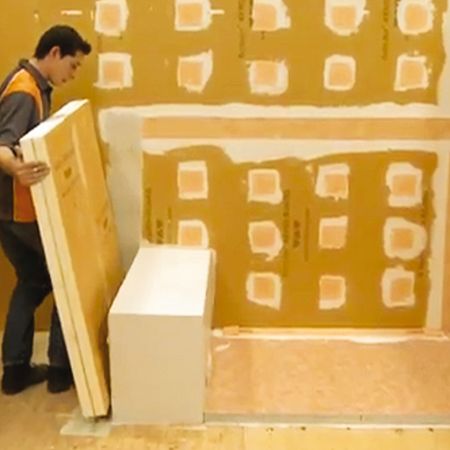 Step 2: Apply thin-set mortar or KERDI-FIX (depending on the surface) to all areas that will make contact with the panels, and set in place.
